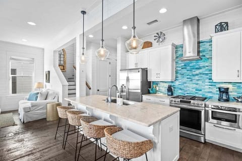 Large open kitchen and stainless steel appliances make cooking a breeze