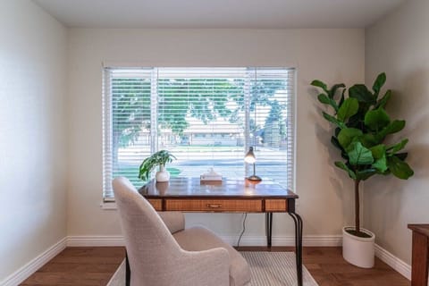 Catch up on some work at the desk.