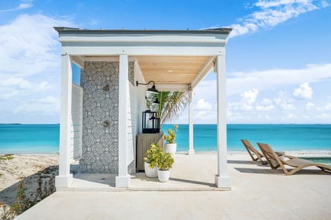 On the beach, sun loungers, beach towels