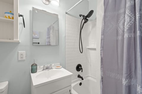 Combined shower/tub, hair dryer, towels, soap