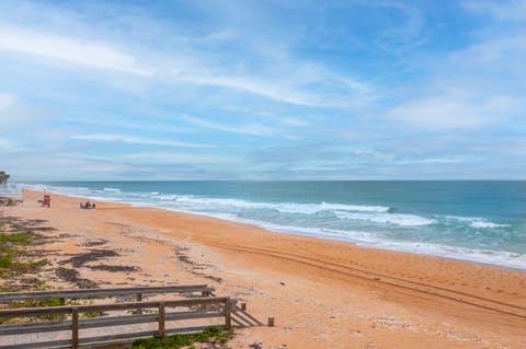 On the beach, sun loungers, beach towels