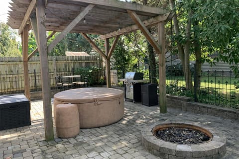 Welcome to Madison Manor. Shared patio with hot tub, fire pit, & grill