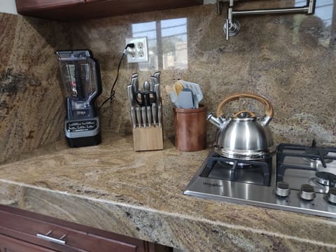 Microwave, oven, coffee/tea maker, cookware/dishes/utensils