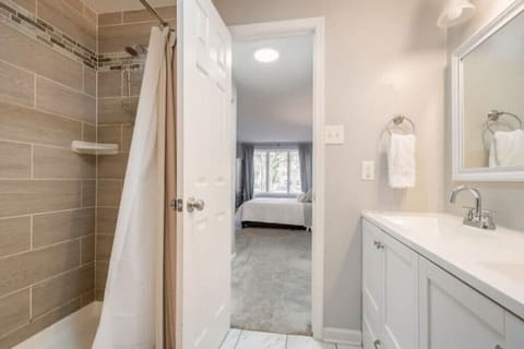 Combined shower/tub, hair dryer, towels, soap