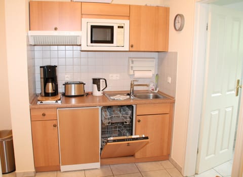 Fridge, microwave, dishwasher, coffee/tea maker