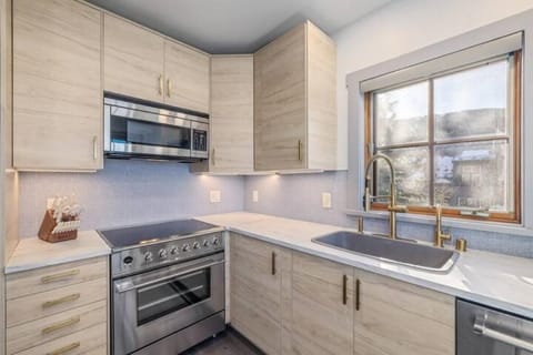 Kitchen with luxury induction range & microwave, Cutco knives that are sharp