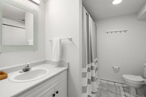 Combined shower/tub, hair dryer, towels, toilet paper