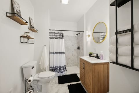 Combined shower/tub, hair dryer, towels, soap