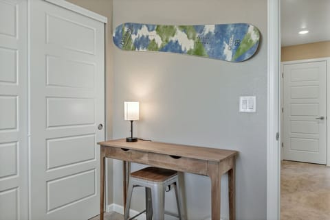 Dedicated workspace and wardrobe available at bedroom 5