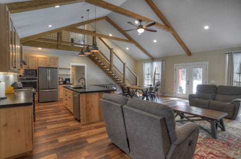 The living room opens to the kitchen and dining area.
