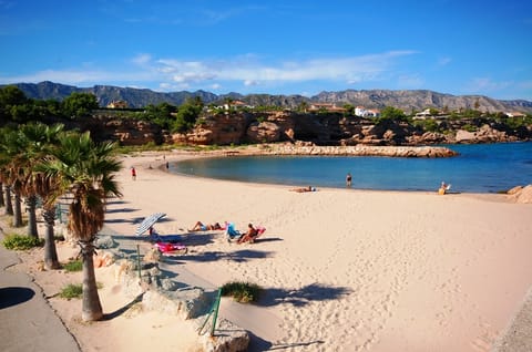 Beach nearby, sun loungers