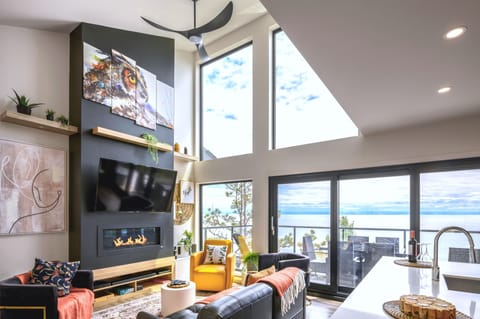 Living area | Smart TV, fireplace, books, stereo