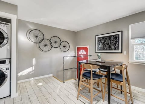 Our inviting dining area welcomes you to gather for memorable meals and conversations. Ample seating, tasteful decor, and great lighting create a warm atmosphere for sharing delicious dishes with family and friends, making every moment special.