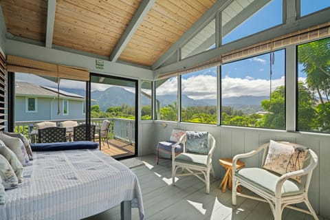 Upstairs screened in area with daybed and incredible views