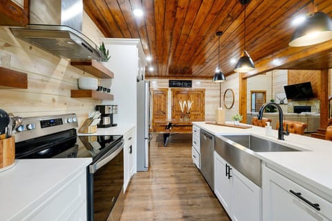 2 ovens, a dishwasher, ample amounts of counter space and an oversized sink!