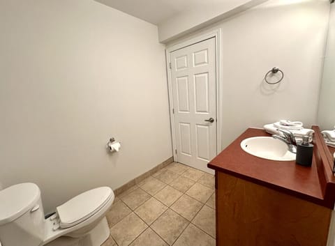 Powder room on main floor with washer and dryer