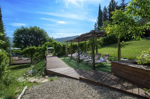 Garden: Relax and unwind in multiple terraces, beautifully landscaped gardens, and seating areas that offer breathtaking panoramic views of the Chianti hills.