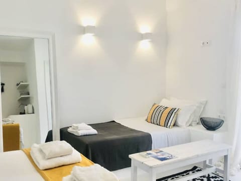 Casa Evriali: a seafront 1st floor studio in Naoussa, Paros - the sofa-bed