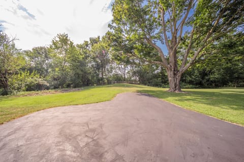 Paved driveway and parking spot.