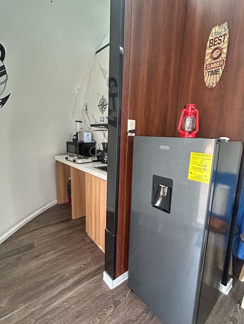 Fridge, microwave, coffee/tea maker, toaster