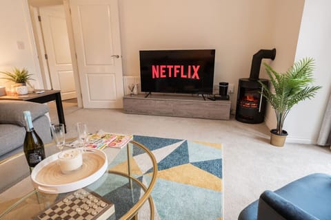 The Living Room: our tranquil living room has a smart TV and a stunning electric fire making it a great space to sit and relax after a days exploring.