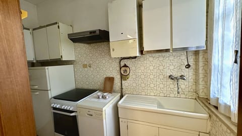 Fridge, oven, dishwasher, dining tables