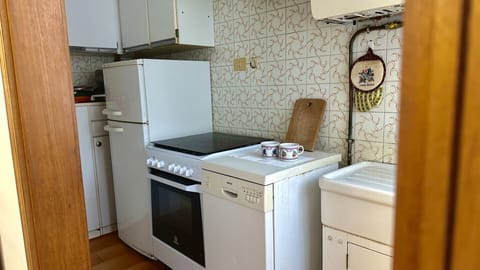 Fridge, oven, dishwasher, dining tables