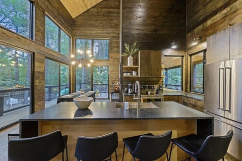 Kitchen is adjacent to the dining room and living room with pass thru to the patio