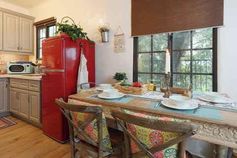 illuminated by elegant light bulbs creating the perfect atmosphere for cooking.