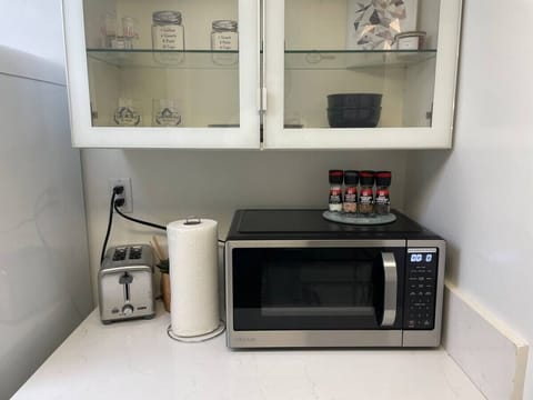 Fridge, microwave, coffee/tea maker, toaster