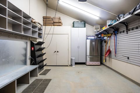 Indoors, Refrigerator, Garage, Floor, Bedroom