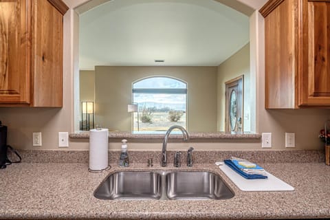 Sunset out the window, snacks on the stove.