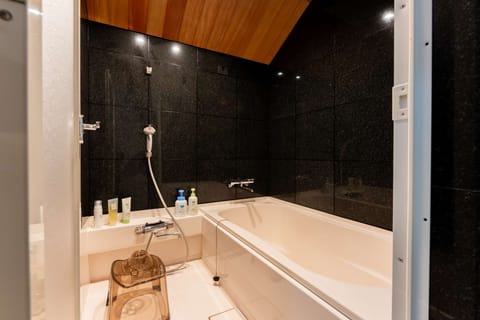 Shower, eco-friendly toiletries, hair dryer, bidet