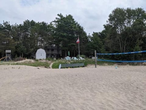 On the beach, sun loungers, beach towels