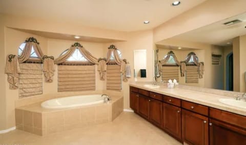 Combined shower/tub, hair dryer, towels, soap