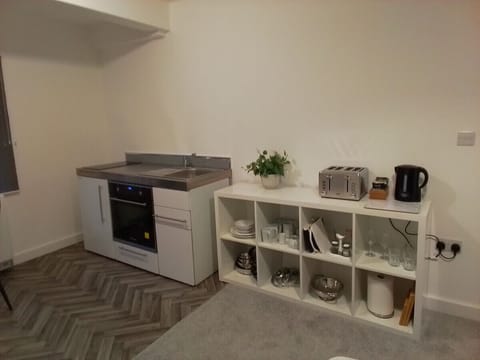 Fridge, oven, toaster, cookware/dishes/utensils