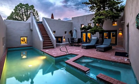 Pool and courtyard at twilight