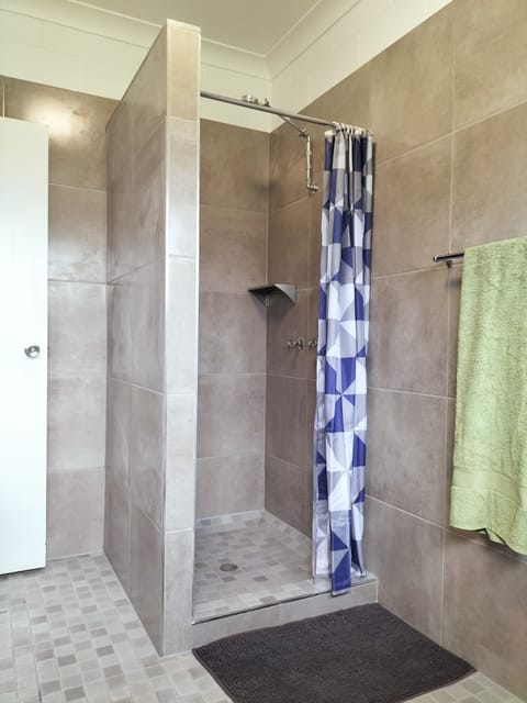 Combined shower/tub, hair dryer, towels, soap