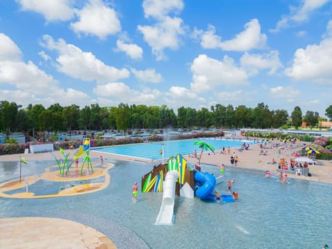 Sky, Cloud, Water, Outdoor Recreation, Leisure, Recreation, Fun, City, Swimming Pool, Tree