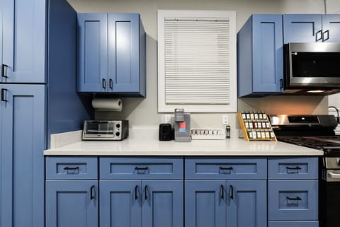 The recently remodeled cabinets complement the color palette of this property. 