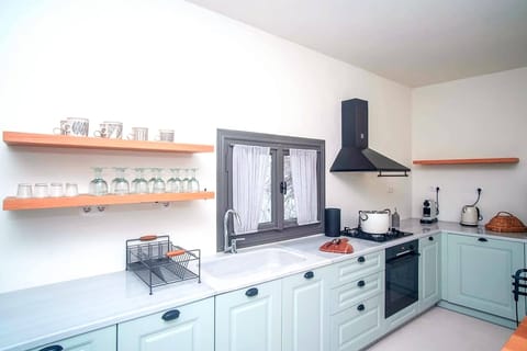 Separate kitchen area with all modern conveniences