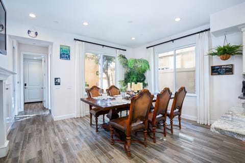 Dining table with 8 chairs. Hope you will book your next family reunion with us