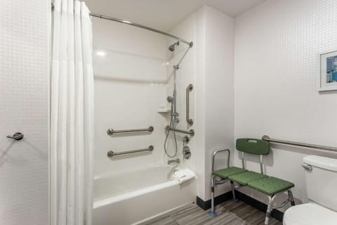 Combined shower/tub, hair dryer, towels, soap