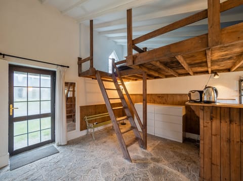Stairs in kitchen leading to loft style bedroom Ventry Farm Parlour Cottage Ventry County Kerry Ireland