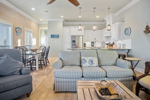 Beach Breeze Living Area: Entertain with ease in the expansive living areas, where every detail exudes luxury and sophistication.