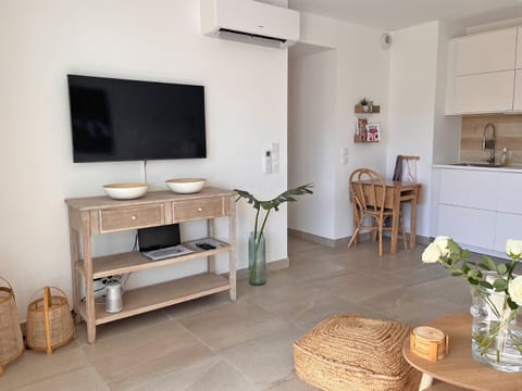 The living room and the kitchen