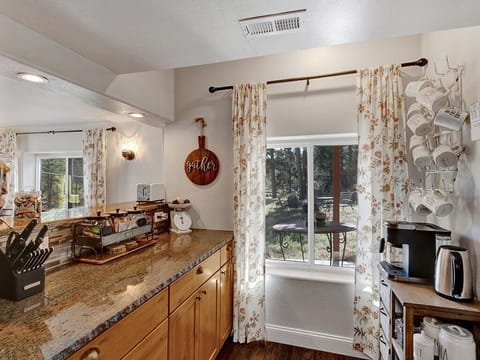 Coffee and tea station. Keurig Duo, electric kettle, French Press, coffee, tea and treats available for your stay.