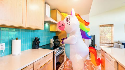 Unice the Unicorn cooking up some rainbow eggs at Coyote Canyon.