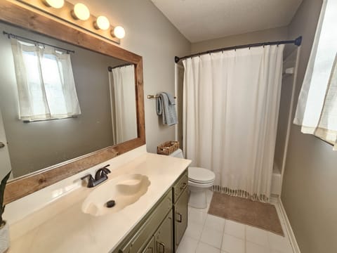 Combined shower/tub, hair dryer, towels, soap