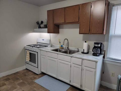 Kitchen is fully equipped with appliances